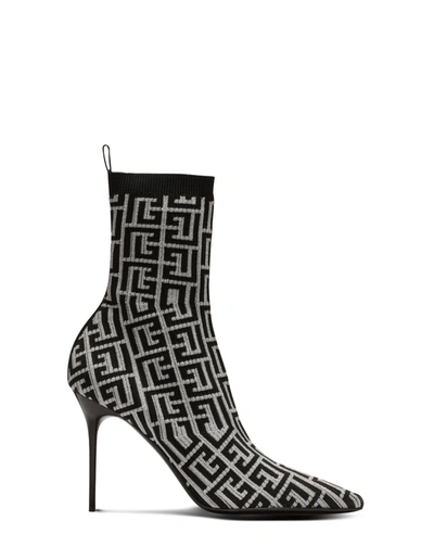 Shop Balmain Skye Ankle Boots In Black And Silver Stretch Knit With  Monogram In Nero