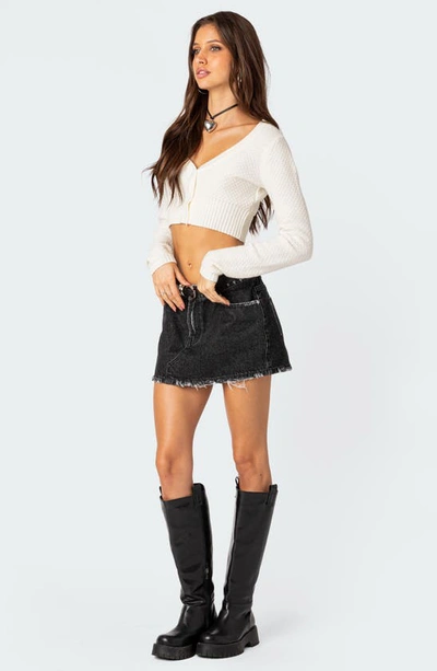 Edikted Scarlett Distressed Denim Miniskirt In Black-washed