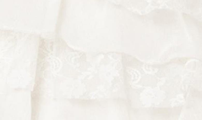 Edikted Adeena Tiered Ruffle Miniskirt In Cream