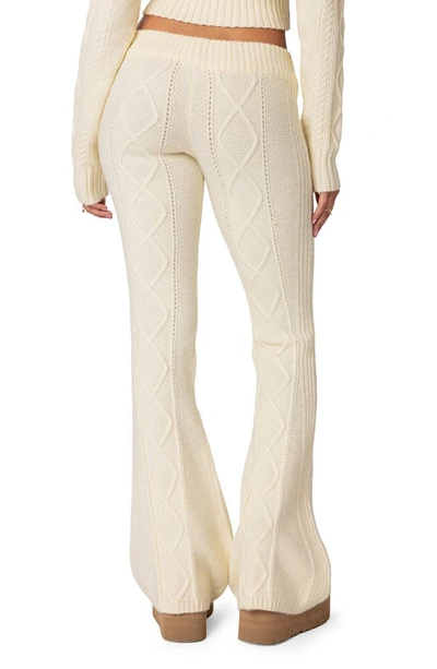 Edikted Ray Cable Stitch Knit Flare Sweater Pants In Cream