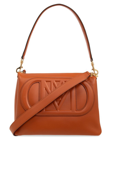 Shop Mcm Travia Logo Embossed Medium Top Handle Bag In Brown
