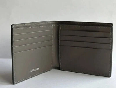 Pre-owned Burberry Bifold Wallet Embossed Logo Leather International Charcoal Grey $480 In Gray