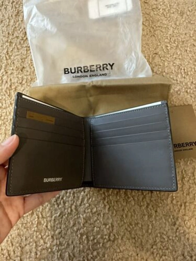 Pre-owned Burberry Bifold Wallet Embossed Logo Leather International Charcoal Grey $480 In Gray