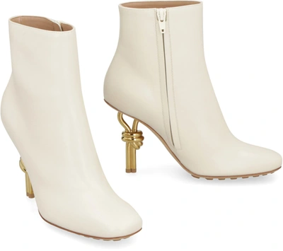 Shop Bottega Veneta Knot Leather Ankle Boots In Ivory