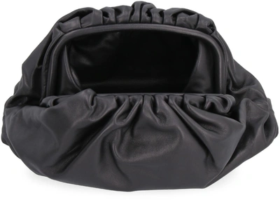 Shop Bottega Veneta Pouch Leather Clutch In Black