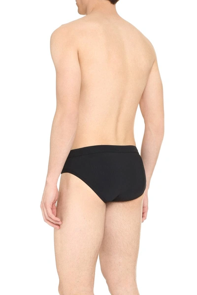 Dolce & Gabbana Black Swim Brief With Metallic Dg Logo In Stretch Polyamide Man In Black