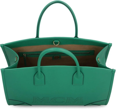 Shop Mcm München Leather Tote In Green