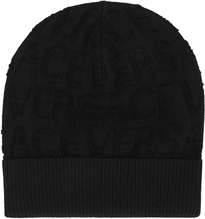 Shop Versace All-over Logoed Wool Bean Hat In Black