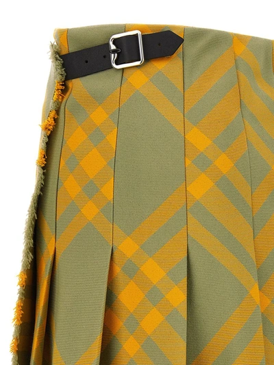 Shop Burberry Check Kilt Skirt In Yellow