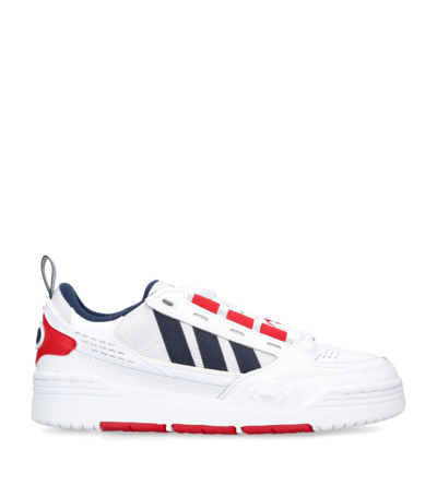 Shop Adidas Originals Adi2000 J Sneakers In White