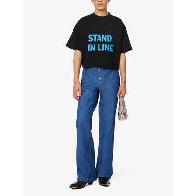 Shop Honey Dijon Men's Black Stand In Line Text-print Boxy-fit Cotton-jersey T-shirt