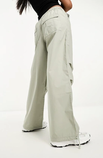Shop Asos Design Parachute Cargo Trousers In Khaki
