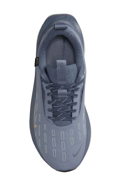 Shop Nike Infinityrn 4 Gore-tex® Waterproof Road Running Shoe In Ashen Slate/ Gold/ Blue
