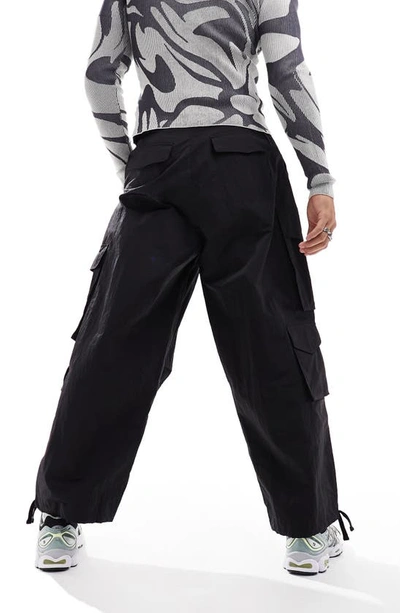 Shop Asos Design Parachute Cargo Pants In Black