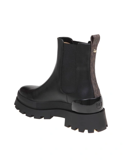 Shop Michael Kors Rowan Ankle Boot In Black Leather
