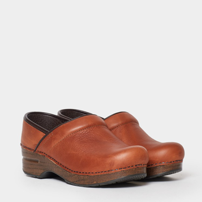 Shop Dansko Classic Tumbled Russet Leather Clog In Brown