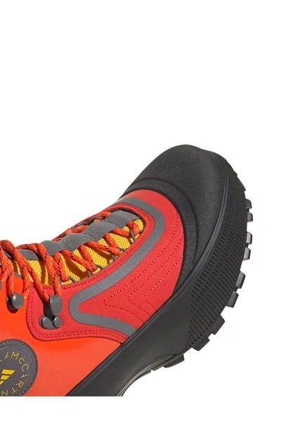 Shop Adidas By Stella Mccartney Terrex Insulated Hiking Boot In Active Red/grey/yellow