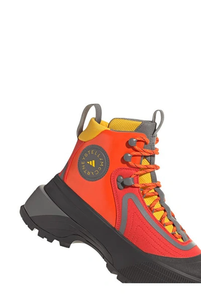 Shop Adidas By Stella Mccartney Terrex Insulated Hiking Boot In Active Red/grey/yellow