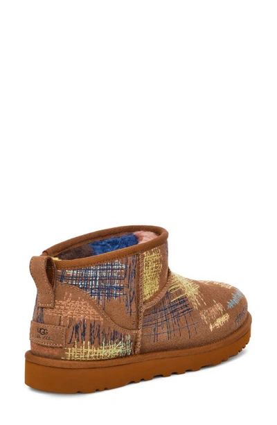 Shop Ugg X The Elder Statesman Classic Ultra Mini Genuine Shearling Lined Bootie In Brown