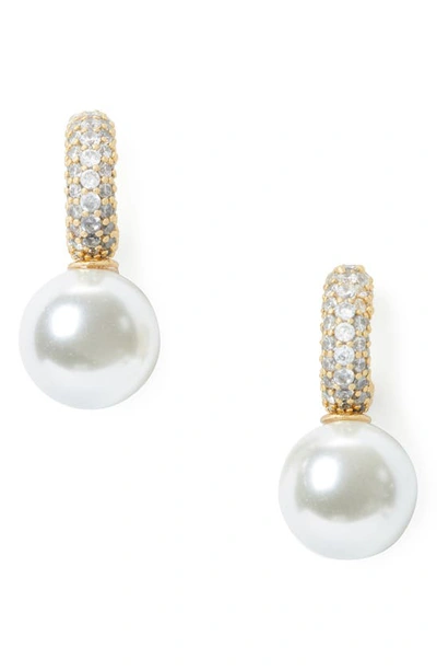 Shop Kate Spade Imitation Pearl Pavé Huggie Hoop Earrings In Cream/ Gold