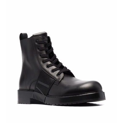 Shop Valentino Garavani  Garavani Leather Logo Boots