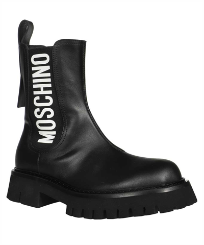 Shop Moschino Leather Chelsea Boots In Black