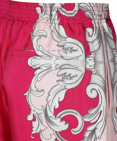 Shop Versace Printed Bermuda Shorts In Fuchsia