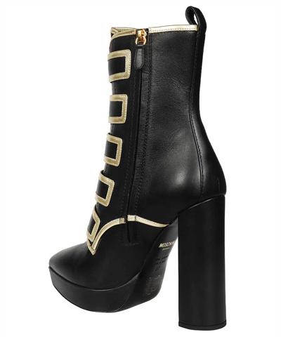 Shop Moschino Leather Ankle Boots In Black