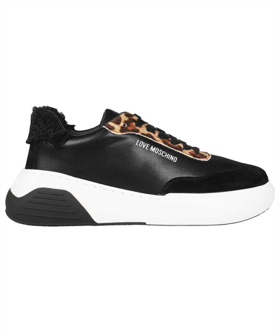 Shop Love Moschino Low-top Sneakers In Black