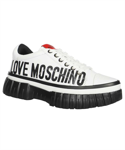 Shop Love Moschino Low-top Sneakers In White