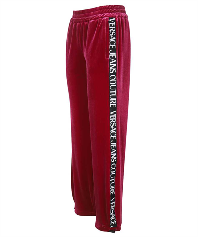 Shop Versace Jeans Couture Velvet Trousers In Burgundy