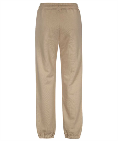 Shop Msgm Logo Print Sweatpants In Beige