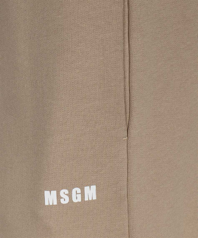 Shop Msgm Logo Print Sweatpants In Beige