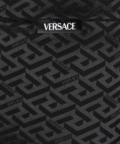 Shop Versace Printed Leggings In Black