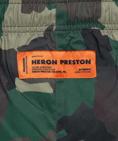 Shop Heron Preston Printed Techno Fabric Bermuda-shorts In Green