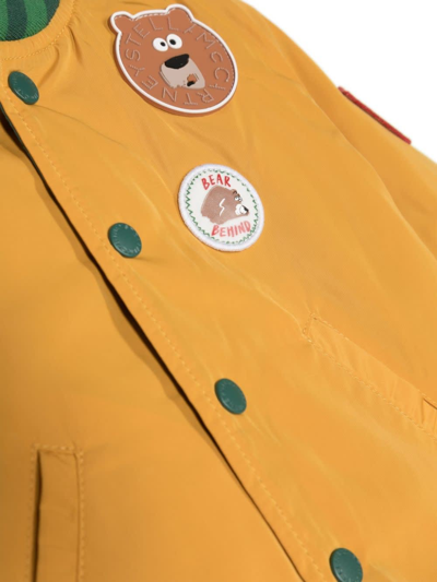 Shop Stella Mccartney Yellow And Green Bomber Jacket With Applied Badges In Giallo