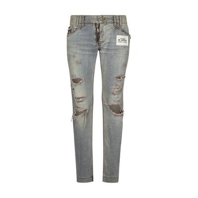Shop Dolce & Gabbana Washed Denim Jeans With Rips In Combined_colour
