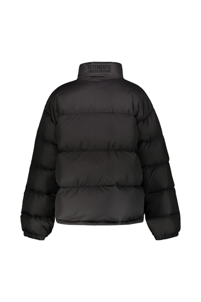 Shop Vetements Logo Puffer Jacket In Black