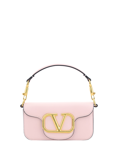 Shop Valentino Garavani Locò Handbag In Rose Quartz