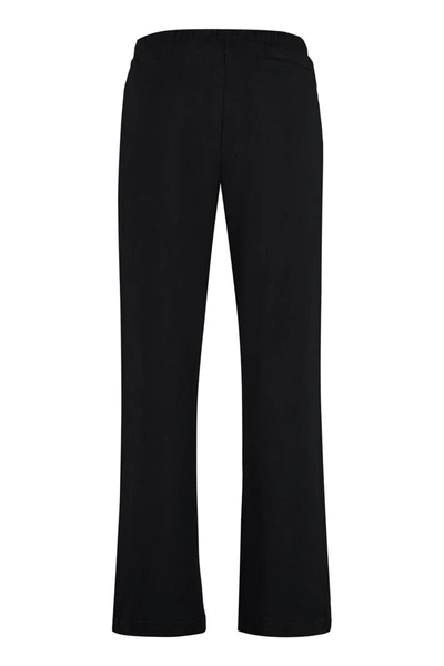 Shop Palm Angels Cotton Trousers In Black