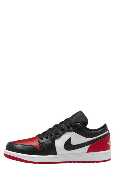 Shop Jordan Air  1 Low Sneaker In White/ Black/ Varsity Red