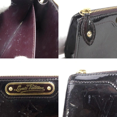 Pre-owned Louis Vuitton Trousse Makeup Purple Patent Leather Clutch Bag ()