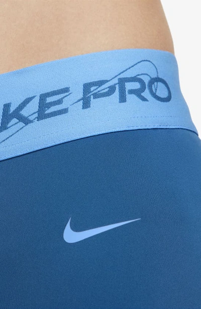 Shop Nike Pro Dri-fit Mid-rise 7/8 Leggings In Industrial Blue/ Blue