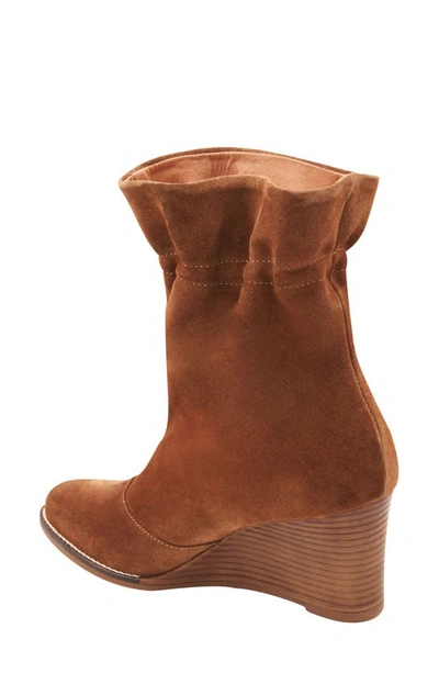 Shop Andre Assous Sunny Paperbag Wedge Boot In Cognac Suede