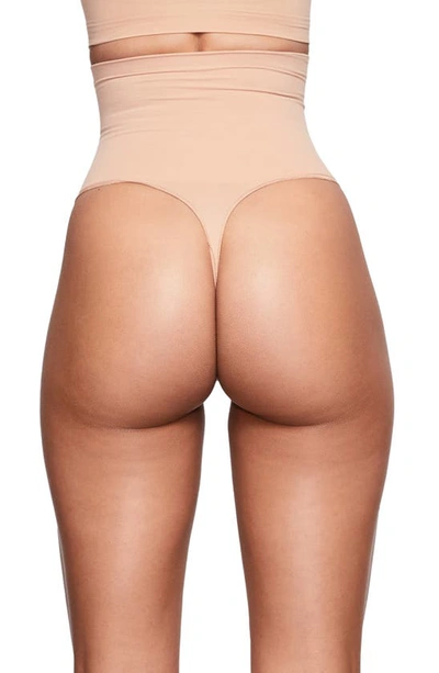 Shop Skims Core Control Thong In Ochre