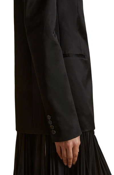 Shop Khaite Otero Asymmetric Double Breasted Satin Jacket In Black