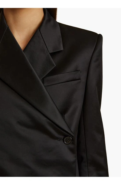 Shop Khaite Otero Asymmetric Double Breasted Satin Jacket In Black