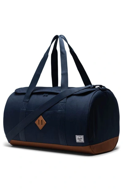 Shop Herschel Supply Co Heritage Duffle Bag In Navy/ Saddle Brown