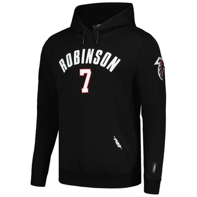 Shop Pro Standard Bijan Robinson Black Atlanta Falcons Player Name & Number Pullover Hoodie