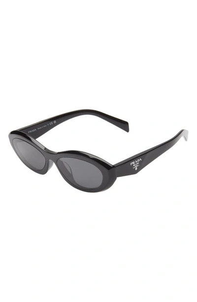 Shop Prada 56mm Oval Sunglasses In Black